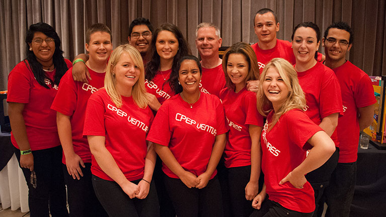 Group of young adults wearing red CPEP Ventures tshirts